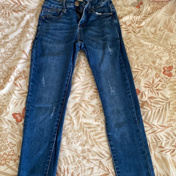 This is a pair of Agorss jeans. It is size 1 and barely worn. - Picture 1 of 4